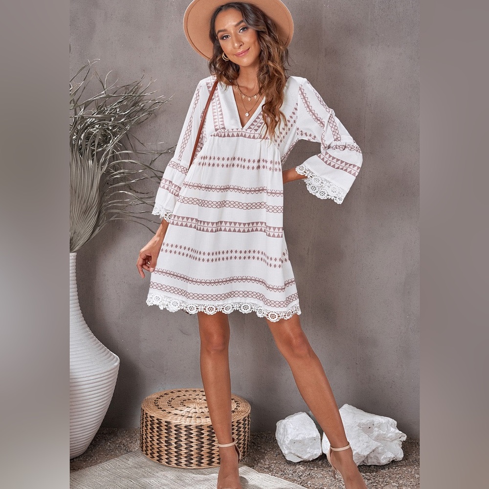 Boho style dress above the knee , caftan style.